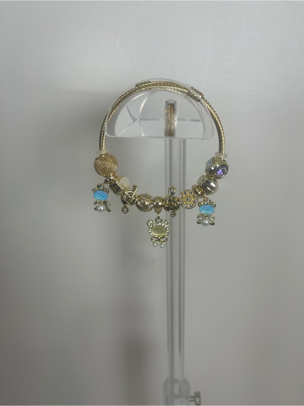 Source Unknown Gold-Tone Charm Bracelet with Blue and Yellow Accents